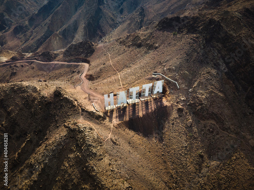 Hatta city sign in Hajar mountains in Hatta enclave of Dubai in the UAE