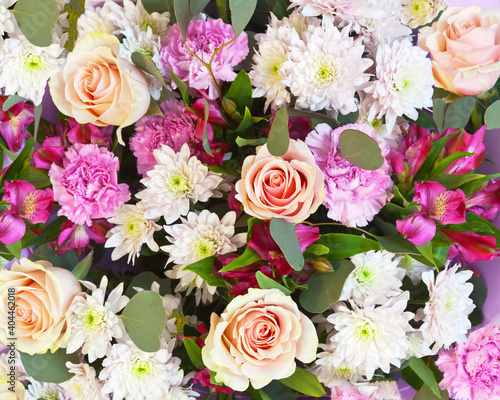 Top view on beautiful fresh flowers of pink shades: carnations, chrysanthemums and roses. Floral texture for background. Romantic congratulation for Valentine's Day, March 8, wedding or Birthday © Katvic