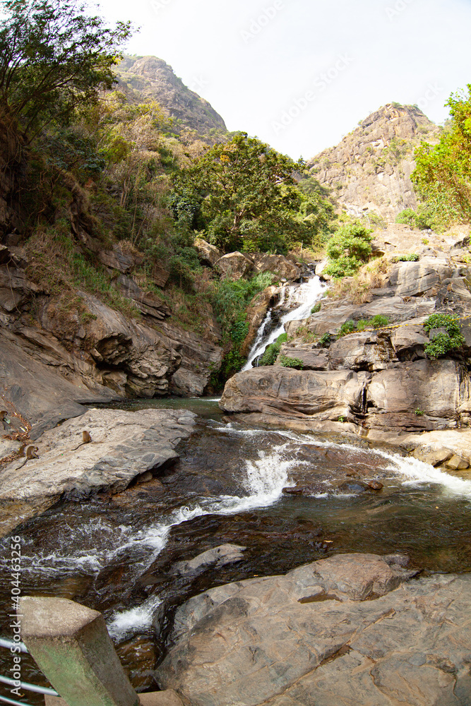Ravana Waterfall in a rutting mountain gorge in Sri Lanka. Ravana Waterfall in a rutting mountain gorge in Sri Lanka.