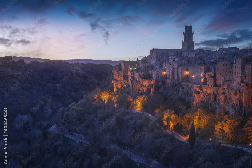 Tuscany, Pitigliano medieval village at blue hour. Italy Tuscany, Pitigliano medieval village at blue hour. Italy