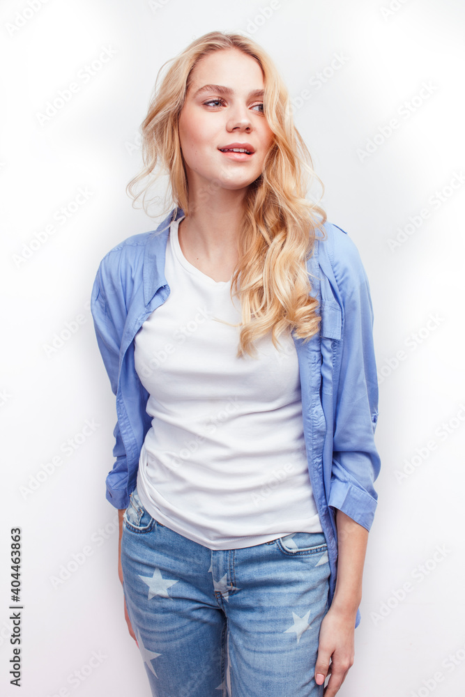young pretty stylish blond hipster girl posing emotional isolated on white background happy smiling cool smile, lifestyle people concept young pretty stylish blond hipster girl posing emotional isolated on white background happy smiling cool smile, lifestyle people concept