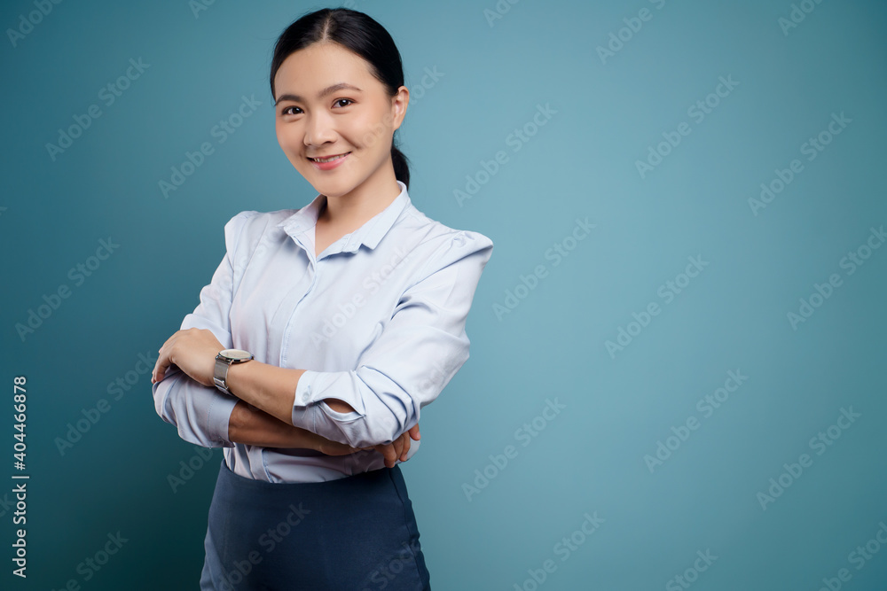 Asian woman happy surprised isolated on blue background. Asian woman happy surprised isolated on blue background.