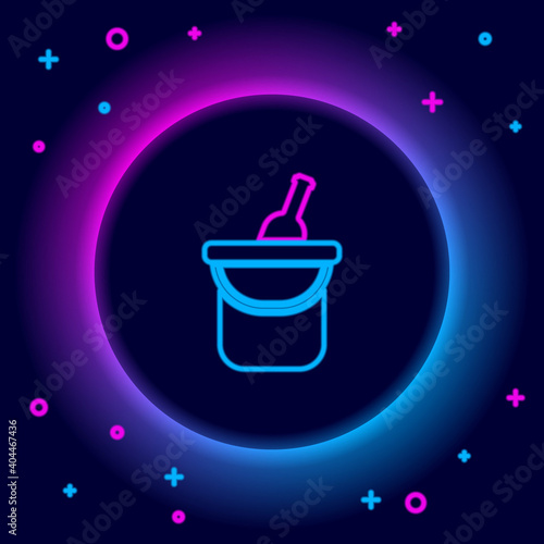 Glowing neon line Bottle of wine in an ice bucket icon isolated on black background. Colorful outline concept. Vector.