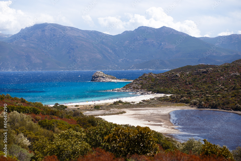 Image about turquoise Mediterranean sea and beach in Corsica in the background.