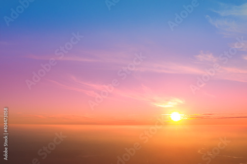 Rural landscape in the misty morning. Aerial view of the countryside during sunrise
