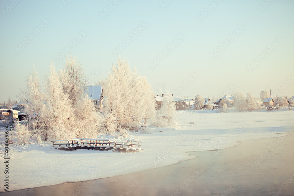 Winter landscape. Frost, white, mist, water, river, forest, tree, evaporation, fog