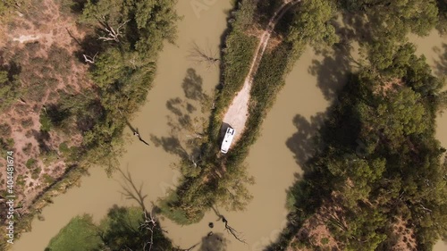 Aerial shots of a motor home exploring the Murray River Basin. Road trip tourism photo