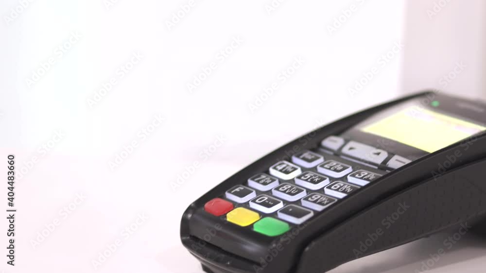 Payment on a trade through mobile and NFC technology. Elevated view Payment on a trade through mobile and NFC technology. Elevated view