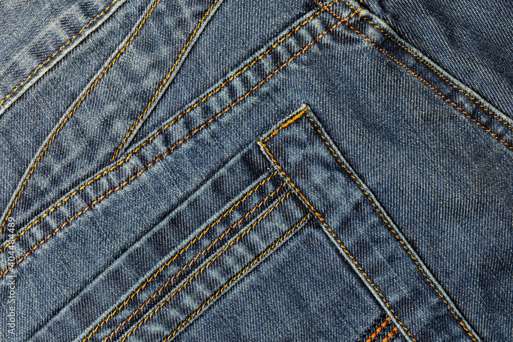 Denim abstract stitched background with pocket, blue jeans fabric texture with seams, youth concept Denim abstract stitched background with pocket, blue jeans fabric texture with seams, youth concept
