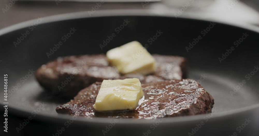 butter slide from beef steak on nonstick pan butter slide from beef steak on nonstick pan