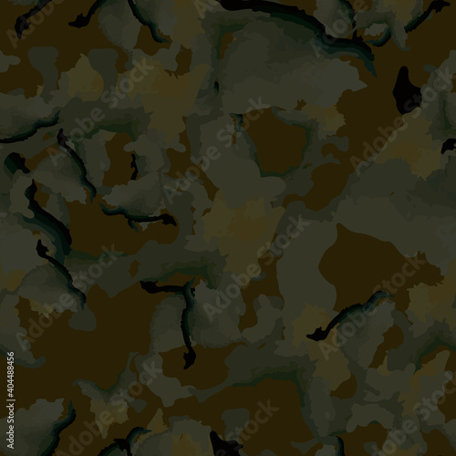 Forest camouflage of various shades of green and brown colors photo