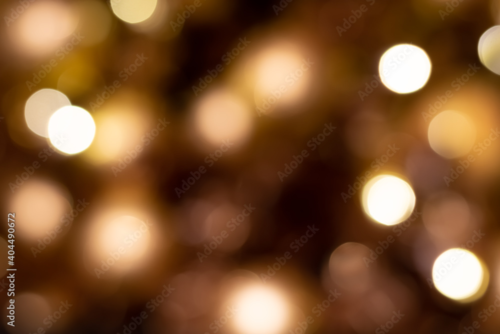 Golden abstract bokeh background with lights