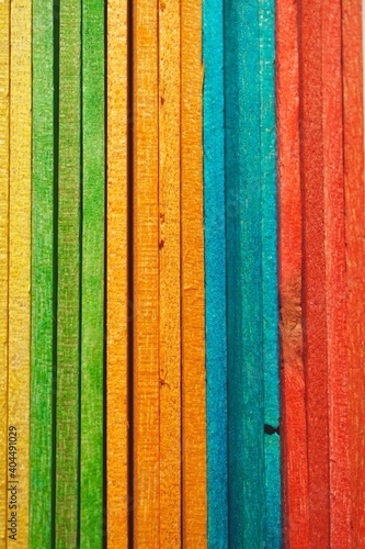 multi colored wooden sticks, colorful bakcground