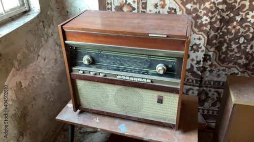 Old soviet radiola Rigonda, dirty in dust photo