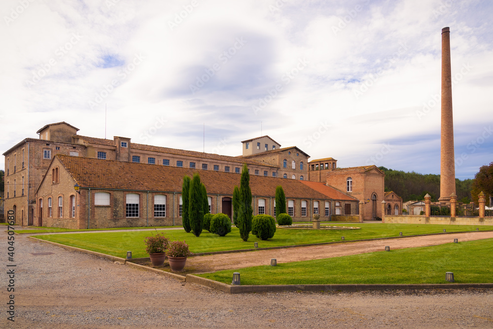 Exterior view of the former Rosinyol manufacturing colony, currently rehabilitated as an industrial museum, located in Manlleu, Catalonia, Spain