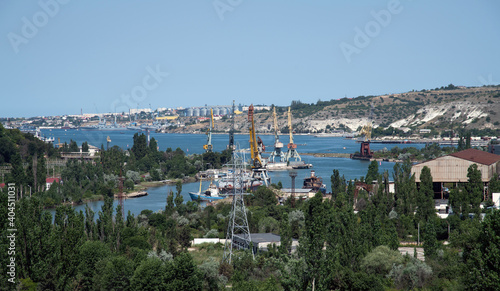 Panorama of Inkerman Bay with cranes, Crimea © olgavolodina