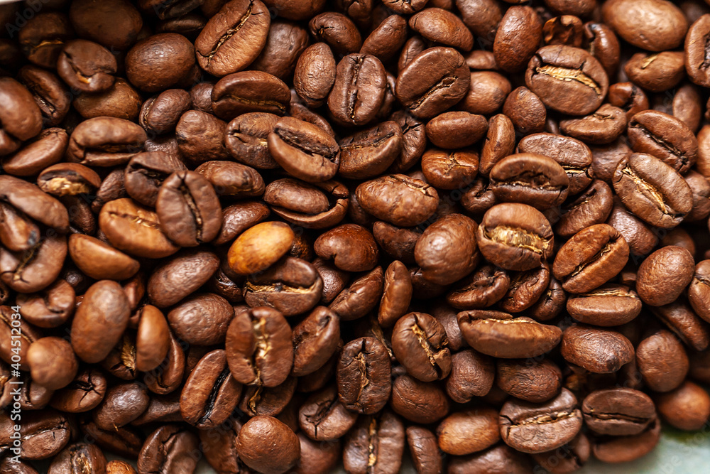Black coffee beans. Roasted coffee beans, can be used as a backg Black coffee beans. Roasted coffee beans, can be used as a backg
