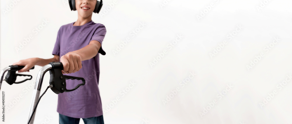 Εκτύπωση καμβά Cropped shot of teenaged disabled boy with cerebral palsy in headphones taking s