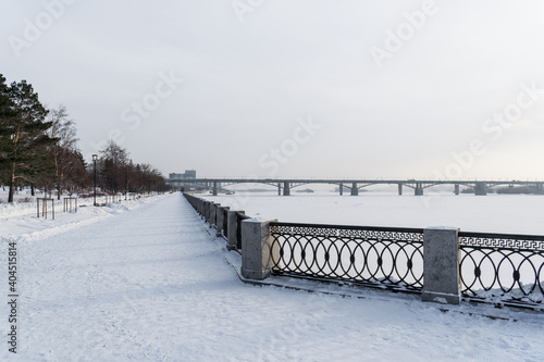 NOVOSIBIRSK, RUSSIA - January 05, 2021: Empty embankment of the Ob river on a frosty day © fizke7