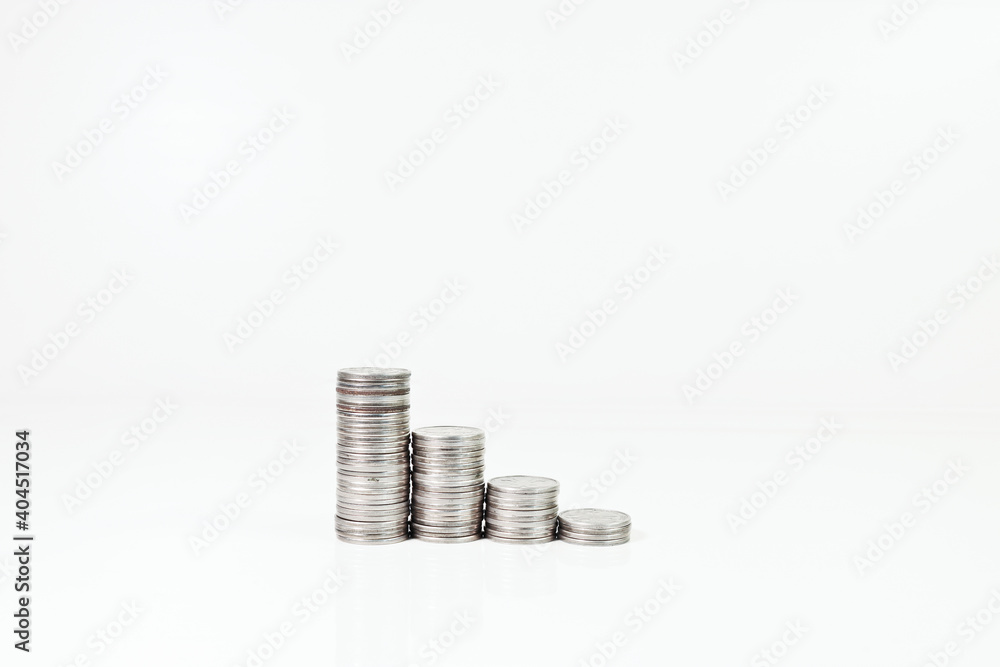 Columns of coins on a light background. Metallic currency. Money. Columns of coins on a light background. Metallic currency. Money.