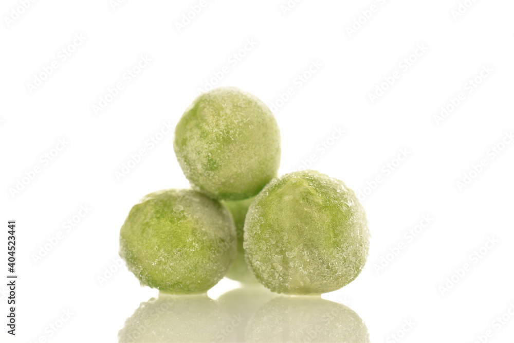 Several Organic Frozen Green Peas, close-up, isolated on white. Several Organic Frozen Green Peas, close-up, isolated on white.