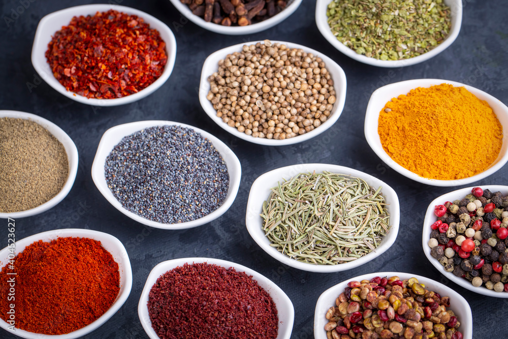 Various spices on black background