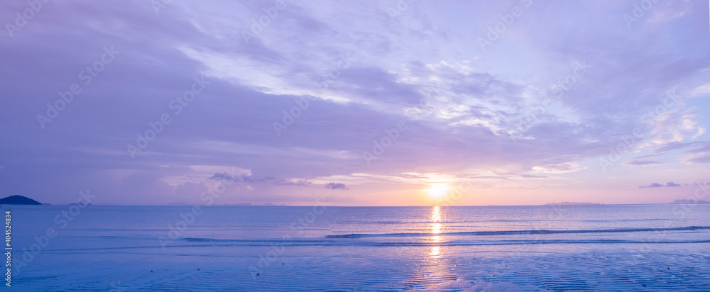 Beautiful panoramic tropical purple blue sea  sunset and yellow clouds background