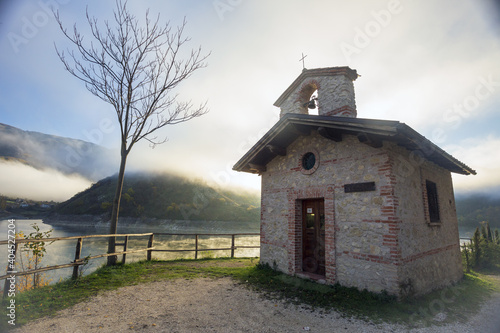 The church of San Rocco in Castel di Tora on Lake Turano in Rieti photo