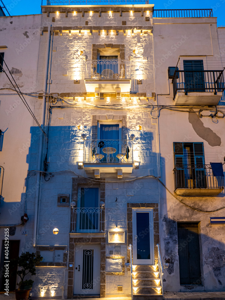 ITALY, MONOPOLI. 2019, JUNE, 10th, The old town of Monopoli, at dusk, Puglia, Italy,