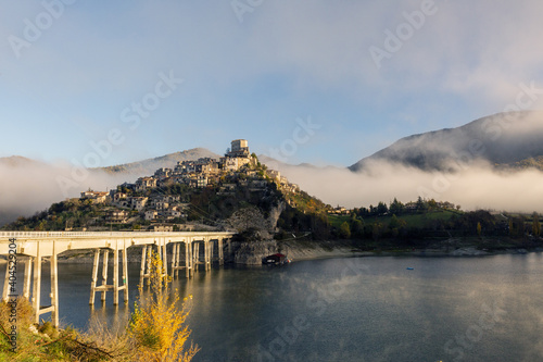 A foggy day at Lake Turano. The colors of autumn in Castel di Tora in Rieti photo