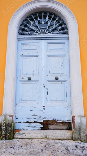 house facade with traditional blue door © Маркіян Паньків