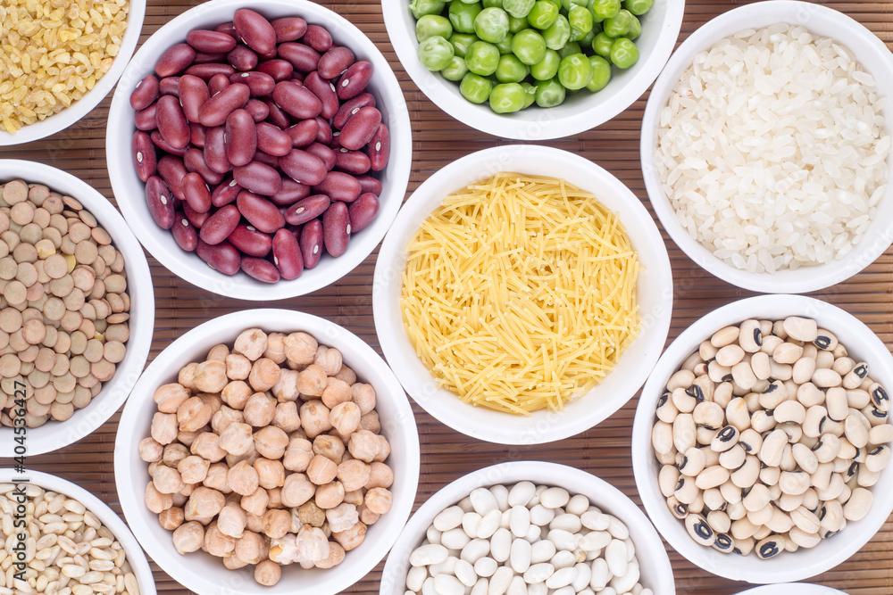 Mixed dried legumes and cereals isolated on white background, top view Mixed dried legumes and cereals isolated on white background, top view