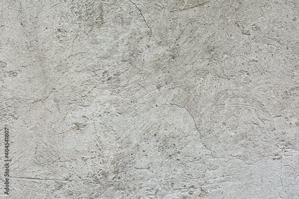 Plaster on the wall inside a residential building during renovation work Plaster on the wall inside a residential building during renovation work