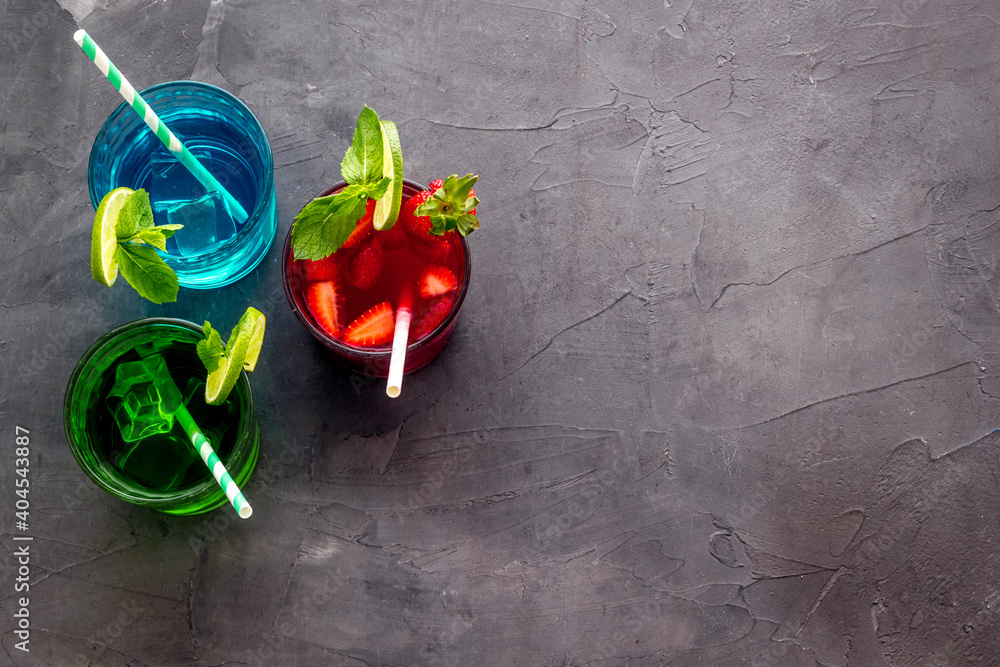 Set of different drinks cocktails with ice - red blue and green. Top view Set of different drinks cocktails with ice - red blue and green. Top view