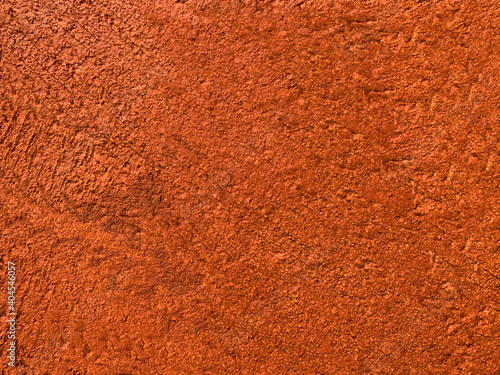 The background image is orange cement. Rough surface, scratches