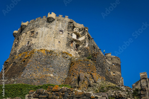 Low angle view on the rampart of the Murol medieval fortress in Auvergne  France