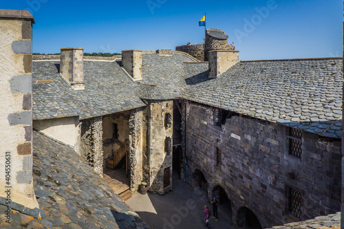 View on the roofs and the bailey of Murol medieval fortress for the parapet walk (Auvergne, France)  photo