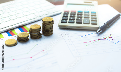 financial accounting analytics document report paperwork progress growth graph with money and chart on table with pen keyboard and calculator work for business planning.
