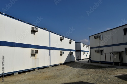 Portacabin, porta cabin, temporary labors camp , Mobile building in industrial site or office container Portable house and office cabins. Labor Camp. Porta cabin. small temporary houses