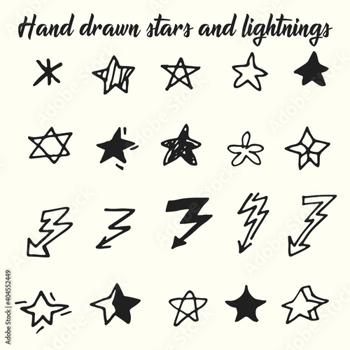 Vector hand drawn set of stars and lightnings icons. Doodle set.