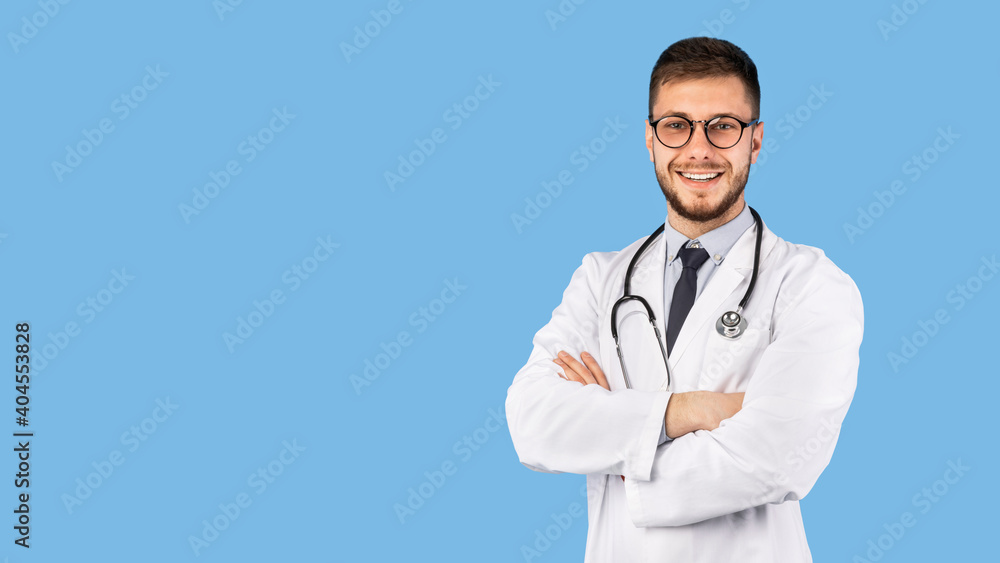 Professional Doctor Man In White Uniform Posing Over Blue Background Professional Doctor Man In White Uniform Posing Over Blue Background