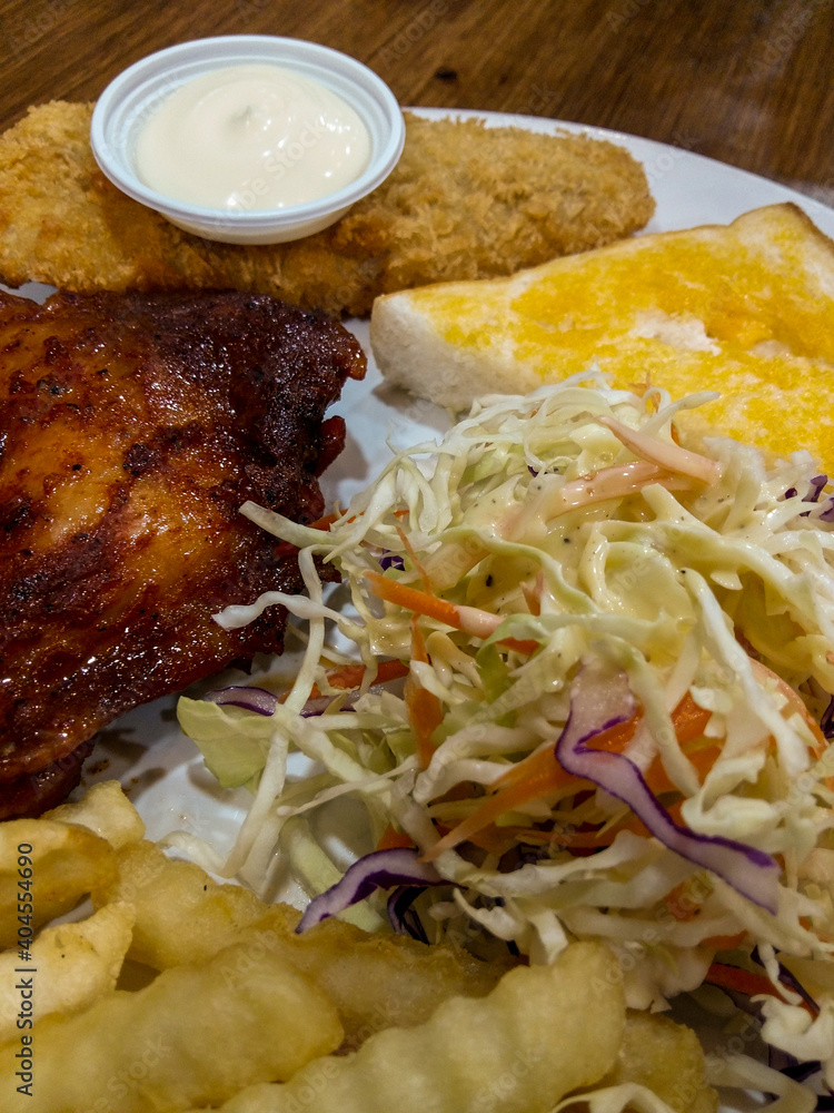 Grilled chicken with fried fish