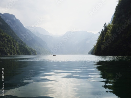 Panorama wooden rowing boat on alpine mountain lake Konigssee Koenigssee King Schonau Berchtesgaden Bavaria Germany alps photo