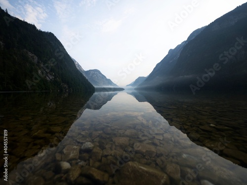 Panorama reflection of alpine mountain lake Konigssee Koenigssee King Schonau Berchtesgaden Bavaria Germany alps photo