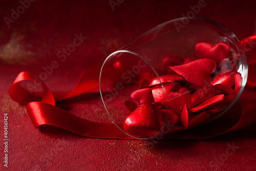Quadro su tela Valentine's day love background with red heart shape sweets, textile decor and g