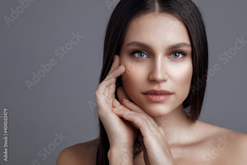 Closeup portrait of a young beautiful woman, skincare concept