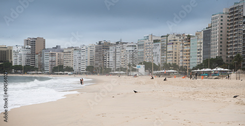  Citizens swim and sunbathe on the beach of Copacabana © Aleksandr