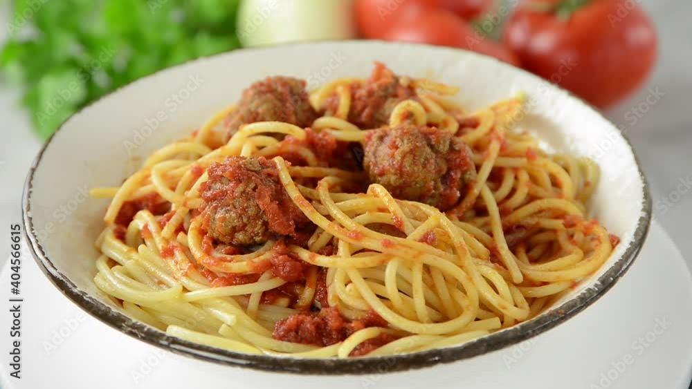 meat balls over spaghetti with tomatoes sauce meat balls over spaghetti with tomatoes sauce