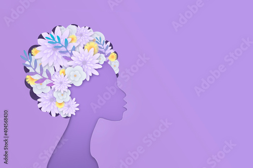 Silhouette of an African-American woman on a purple background. Hairstyle decorated with flowers. Postcard, banner. Congratulations on the International Women's Day. Beauty concept. Spring flowers. Th
