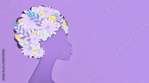 Silhouette of an African-American woman on a purple background. Hairstyle decorated with flowers. Postcard, banner. Congratulations on the International Women's Day. Beauty concept. Spring flowers. Th © Valentina Shilkina